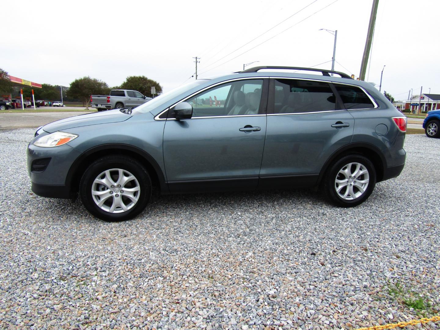 2012 Blue /Gray Mazda CX-9 Touring (JM3TB2CV1C0) with an 3.7L V6 DOHC 24V engine, Automatic transmission, located at 15016 S Hwy 231, Midland City, AL, 36350, (334) 983-3001, 31.306210, -85.495277 - Photo#2